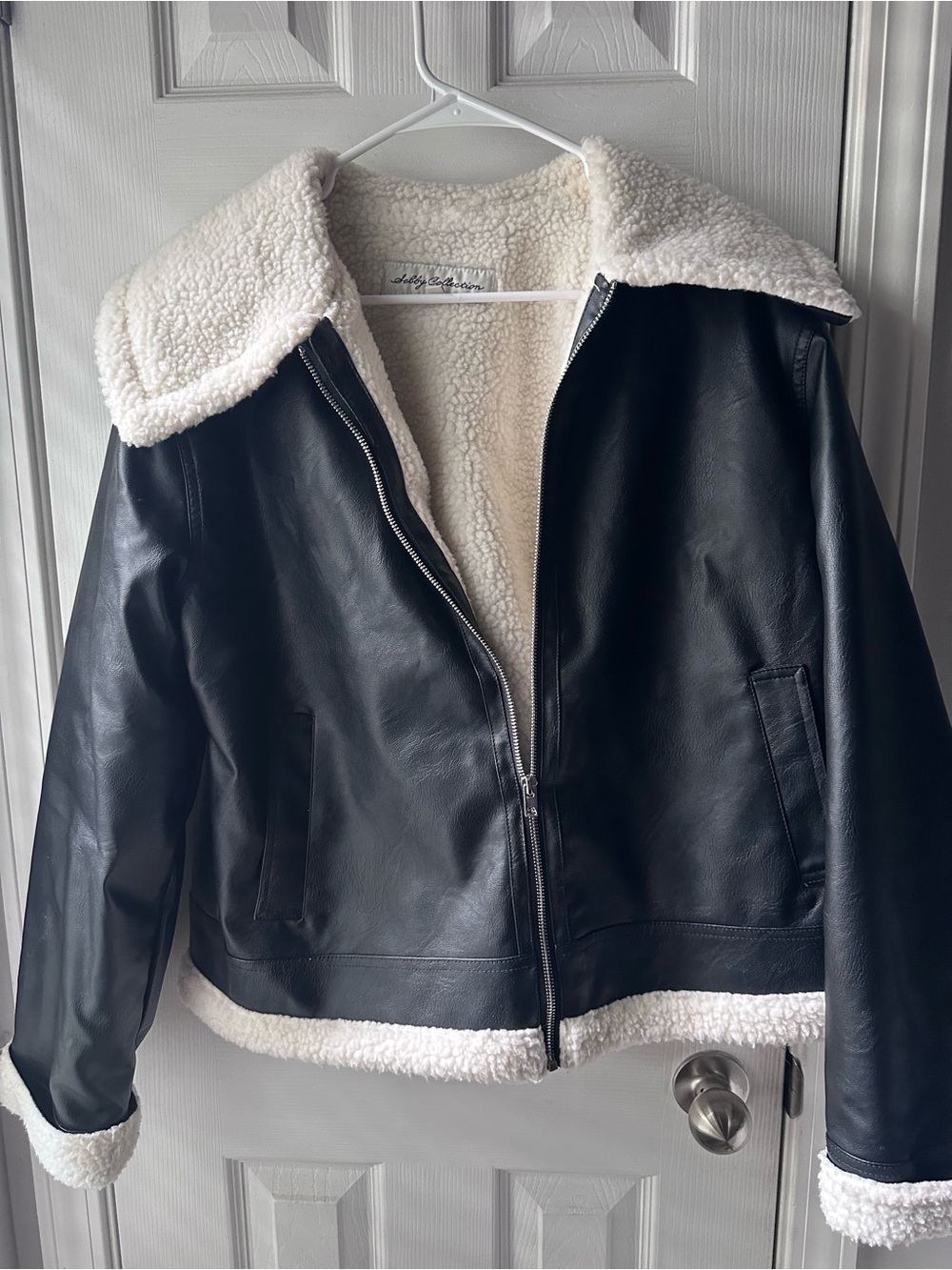 Black Faux Leather Jacket with Cream Sherpa Lining